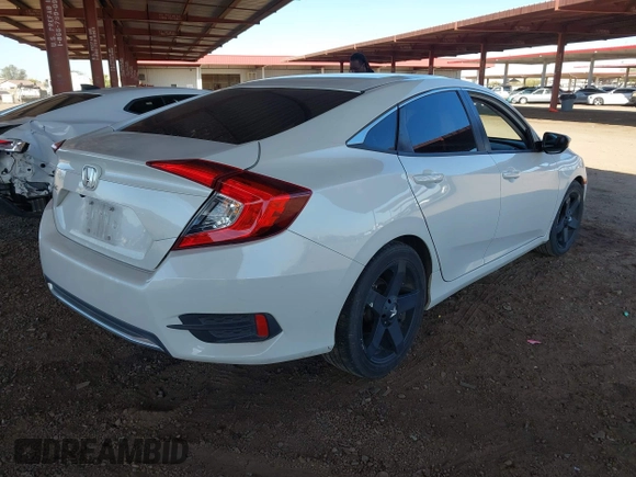 2020 Honda Civic LX with VIN 19XFC2F66LE007328, listed as a IAAI auction lot 41852111 with 135,956 mi miles and . Bid and sale history available at DreamBid. Image 4.