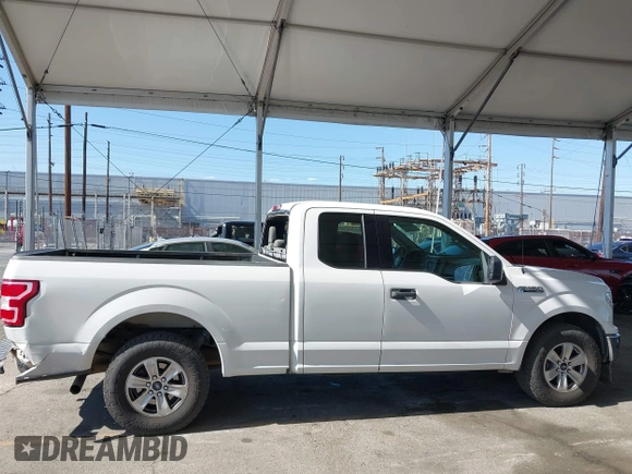 2018 Ford F-150 XL z VIN 1FTEX1CP3JFB32667, wystawiony jako IAAI lot #42242939 z przebiegiem 149 549 mil mil oraz . Historia ofert i sprzedaży dostępna na DreamBid. Obrazek 13.