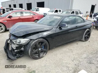 2015 BMW 4 Series 435i with VIN WBA3T3C59FP738972, listed as a Copart auction lot 50323265 with 131,982 mi miles and Salvage Title. Bid and sale history available at carsss.com. Image 1.