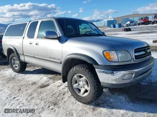 2002 Toyota Tundra SR5 with VIN 5TBBT44192S225410, listed as a IAAI auction lot 41402257 with 218,842 mi miles. Bid and sale history available at carsss.com. Image 1.
