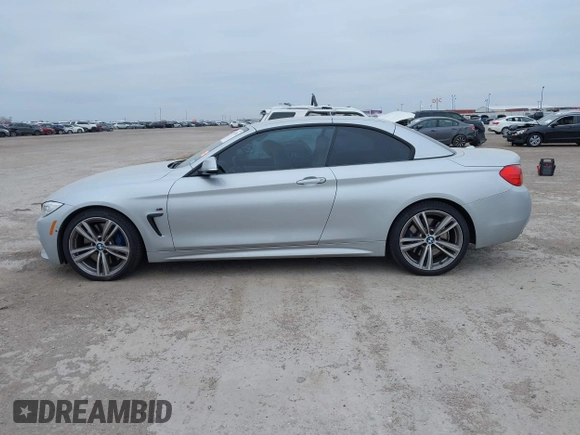 2014 BMW 4 Series 435i z VIN WBA3T3C55EP737428, wystawiony jako IAAI lot #41347382 z przebiegiem 129 513 mil mil oraz . Historia ofert i sprzedaży dostępna na DreamBid. Obrazek 14.