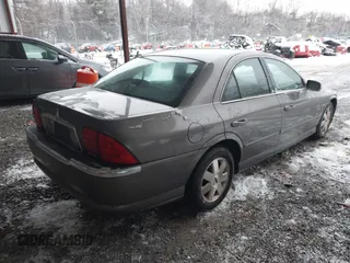 2002 Lincoln LS w/Base Pkg with VIN 1LNHM87A32Y702060, listed as a IAAI auction lot 41614303 with 172,783 mi miles. Bid and sale history available at carsss.com. Image 4.