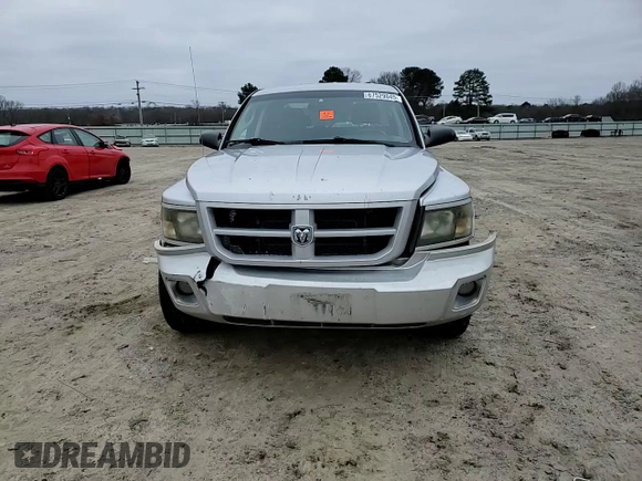 2010 Dodge Dakota Bighorn/Lonestar z VIN 1D7CE3GK3AS202401, wystawiony jako Copart lot #87529045 z przebiegiem 175 258 mil mil oraz Czysty tytuł • Clean title. Historia ofert i sprzedaży dostępna na DreamBid. Obrazek 11.
