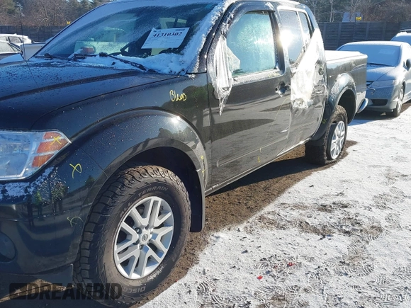 2018 Nissan Frontier SV with VIN 1N6AD0EV0JN718047, listed as a IAAI auction lot 41310302 with 103,488 mi miles and . Bid and sale history available at DreamBid. Image 6.