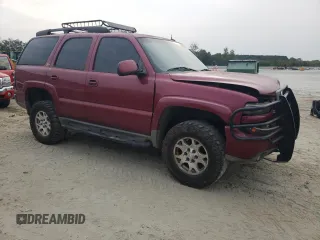 2004 Chevrolet Tahoe LT with VIN 1GNEK13Z74R292545, listed as a Copart auction lot 71078914 with 293,590 mi miles and Salvage Title. Bid and sale history available at carsss.com. Image 4.
