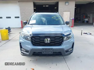 2023 Honda Passport Elite with VIN 5FNYF8H03PB000039, listed as a IAAI auction lot 40593339 with 33,697 mi miles and . Bid and sale history available at DreamBid. Image 12.