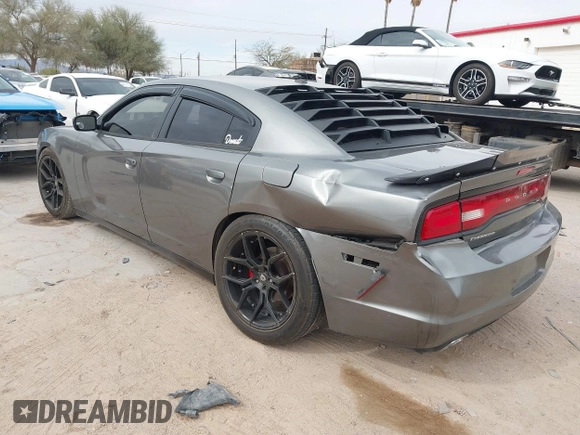 2012 Dodge Charger SXT with VIN 2C3CDXHG8CH244592, listed as a IAAI auction lot 41548991 with 116,855 mi miles. Bid and sale history available at carsss.com. Image 3.