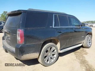 2015 GMC Yukon SLT z VIN 1GKS1BKC8FR112952, wystawiony jako IAAI lot #41836398 z przebiegiem 155 329 mil mil oraz . Historia ofert i sprzedaży dostępna na DreamBid. Obrazek 4.