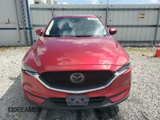 2018 Mazda CX-5 Grand Touring с VIN JM3KFBDM1J0332117, выставлен на аукционе Copart как лот 59379085 с пробегом 95 527 миль миль и Списание • Salvage title. История ставок и продаж доступна на DreamBid. Изображение 5.
