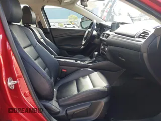 2017 Mazda Mazda6 Touring with VIN JM1GL1V56H1155982, listed as a IAAI auction lot 42055447 with 59,566 mi miles. Bid and sale history available at carsss.com. Image 5.