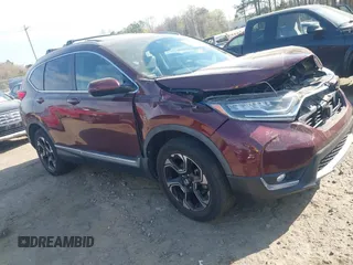 2018 Honda CR-V Touring with VIN 7FARW2H9XJE064414, listed as a IAAI auction lot 41904372 with 88,219 mi miles and . Bid and sale history available at carsss.com. Image 1.