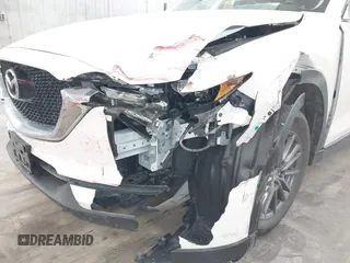2017 Mazda CX-5 Touring with VIN JM3KFBCL9H0107589, listed as a IAAI auction lot 41241481 with 77,032 mi miles. Bid and sale history available at carsss.com. Image 6.