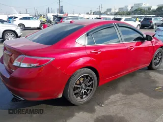 2009 Mazda 6 S Grand Touring with VIN 1YVHP82B795M34101, listed as a IAAI auction lot 41434441 with 125,481 mi miles and . Bid and sale history available at DreamBid. Image 4.