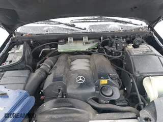 2001 Mercedes-Benz M-Class with VIN 4JGAB54E21A252034, listed as a IAAI auction lot 41573177 with 168,672 mi miles. Bid and sale history available at carsss.com. Image 10.