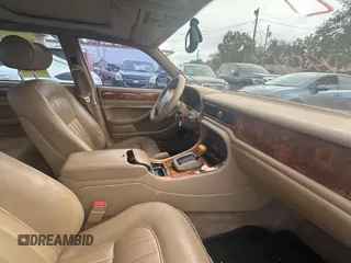 1995 Jaguar XJ with VIN SAJHX174XSC738291, listed as a Copart auction lot 87054224 with 71,076 mi miles and Clean title. Bid and sale history available at DreamBid. Image 5.