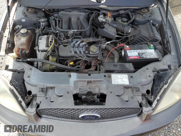 2004 Ford Taurus SE with VIN 1FAFP53U24A137741, listed as a Copart auction lot 54313915 with 92,739 mi miles and Salvage Title. Bid and sale history available at DreamBid. Image 11.