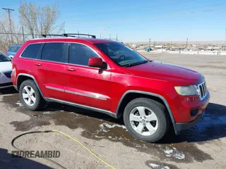 2011 Jeep Grand Cherokee 70th Anniversary with VIN 1J4RR4GT2BC703163, listed as a IAAI auction lot 41763149 with 184,523 mi miles. Bid and sale history available at carsss.com. Image 13.