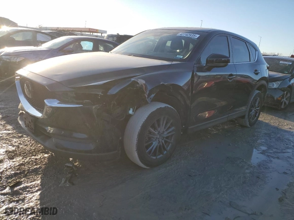 2019 Mazda CX-5 Touring with VIN JM3KFACM7K1593064, listed as a Copart auction lot 42742935 with NaN miles and Salvage Title. Bid and sale history available at carsss.com. Image 1.