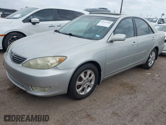 2006 Toyota Camry LE z VIN 4T1BF32K86U119208, wystawiony jako IAAI lot #42127284 z przebiegiem 99 864 mil mil oraz . Historia ofert i sprzedaży dostępna na DreamBid. Obrazek 2.