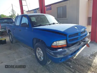 2001 Dodge Dakota Sport z VIN 1B7GL2AX21S113967, wystawiony jako IAAI lot #42446937 z przebiegiem 235 698 mil mil oraz . Historia ofert i sprzedaży dostępna na DreamBid. Obrazek 1.