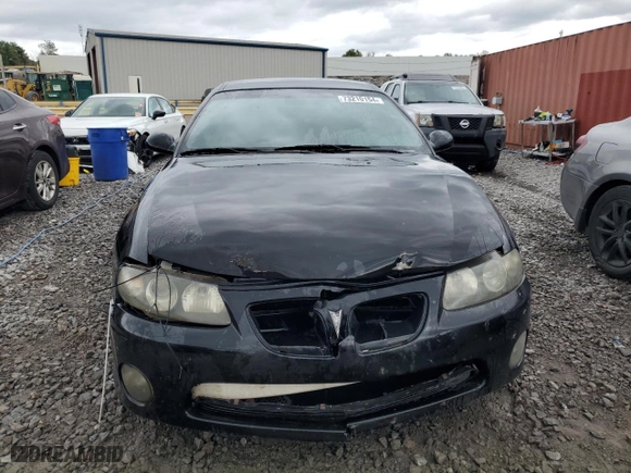 2004 Pontiac GTO with VIN 6G2VX12G94L250415, listed as a Copart auction lot 73210154 with 144,494 mi miles and Salvage Title. Bid and sale history available at carsss.com. Image 5.