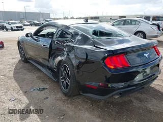 2021 Ford Mustang EcoBoost with VIN 1FA6P8TH6M5153650, listed as a IAAI auction lot 41119626 with 54,311 mi miles. Bid and sale history available at carsss.com. Image 3.