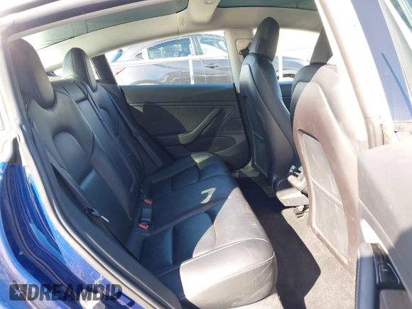 2019 Tesla Model 3 Mid Range with VIN 5YJ3E1EA8KF436086, listed as a IAAI auction lot 41682093 with 70,332 mi miles and . Bid and sale history available at DreamBid. Image 8.