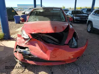 2022 Tesla Model Y Long Range z VIN 7SAYGDEE3NF436119, wystawiony jako Copart lot #54892115 z przebiegiem 27 054 mil mil oraz Szkody całkowita. Historia ofert i sprzedaży dostępna na DreamBid. Obrazek 5.