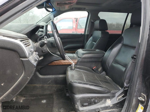2017 Chevrolet Suburban Premier with VIN 1GNSKJKCXHR403076, listed as a Copart auction lot 46606025 with 99,481 mi miles and Salvage Title. Bid and sale history available at carsss.com. Image 7.