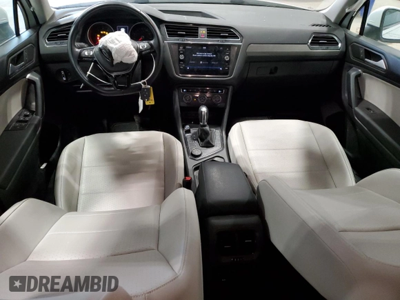 2019 Volkswagen Tiguan SE with VIN 3VV2B7AX0KM157357, listed as a Copart auction lot 55564975 with 57,421 mi miles and Salvage Title. Bid and sale history available at DreamBid. Image 8.