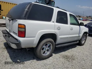 2004 Chevrolet Tahoe LS z VIN 1GNEC13T94R165160, wystawiony jako Copart lot #59994985 z przebiegiem 303 473 mil mil oraz Szkoda całkowita • Salvage title. Historia ofert i sprzedaży dostępna na DreamBid. Obrazek 3.