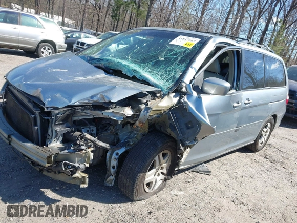 2005 Honda Odyssey EX-L with VIN 5FNRL38645B134981, listed as a IAAI auction lot 41847669 with 153,864 mi miles. Bid and sale history available at carsss.com. Image 2.