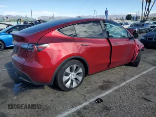2024 Tesla Model Y Long Range with VIN 7SAYGDEE7RF009984, listed as a Copart auction lot 41662185 with Not Provided miles and Salvage Title. Bid and sale history available at DreamBid. Image 3.