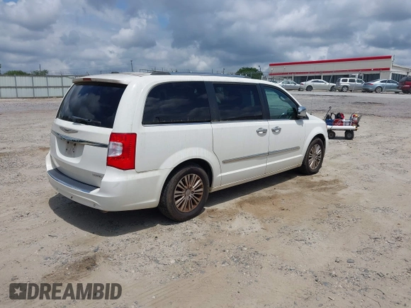2011 Chrysler Town & Country Limited with VIN 2A4RR6DG8BR714484, listed as a IAAI auction lot 42155728 with 181,162 mi miles. Bid and sale history available at carsss.com. Image 4.