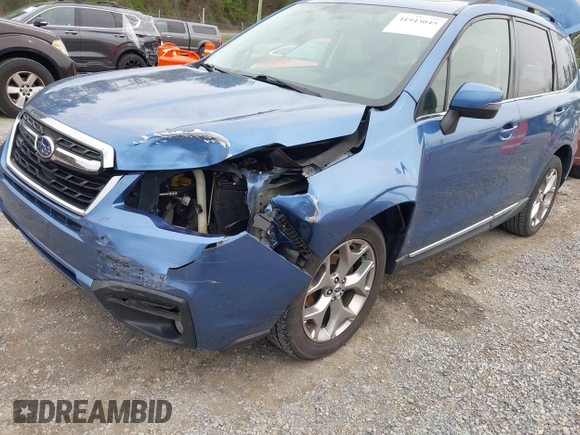 2017 Subaru Forester Touring with VIN JF2SJAWC1HH443799, listed as a IAAI auction lot 41943045 with 122,213 mi miles and . Bid and sale history available at DreamBid. Image 17.