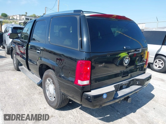 2005 Cadillac Escalade with VIN 1GYEC63T35R147108, listed as a IAAI auction lot 42474950 with 181,187 mi miles and . Bid and sale history available at DreamBid. Image 3.