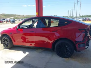2020 Tesla Model Y Long Range with VIN 5YJYGDEE0LF029496, listed as a IAAI auction lot 41977695 with 47,958 mi miles and . Bid and sale history available at DreamBid. Image 13.