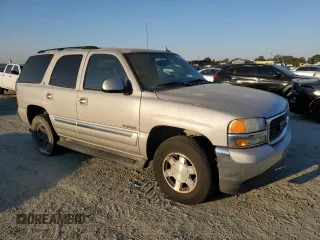 2005 GMC Yukon SLE with VIN 1GKEC13TX5J151930, listed as a Copart auction lot 73030094 with 216,351 mi miles and Clean Title. Bid and sale history available at carsss.com. Image 4.
