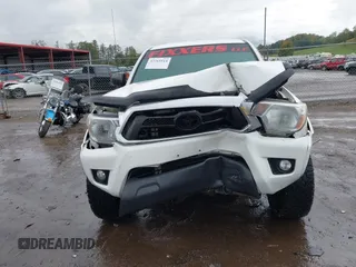 2014 Toyota Tacoma with VIN 3TMLU4EN9EM140999, listed as a IAAI auction lot 37765514 with 168,875 mi miles. Bid and sale history available at carsss.com. Image 6.
