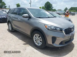 2019 Kia Sorento LX with VIN 5XYPG4A5XKG555143, listed as a IAAI auction lot 42604971 with 118,522 mi miles and . Bid and sale history available at DreamBid. Image 1.
