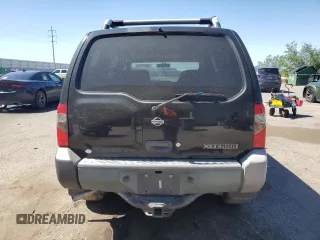 2001 Nissan Xterra XE with VIN 5N1ED28T01C522269, listed as a Copart auction lot 56997515 with 103,800 mi miles and Salvage title. Bid and sale history available at DreamBid. Image 6.