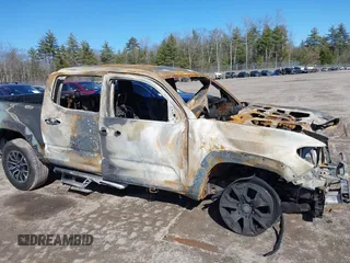 2023 Toyota Tacoma SR z VIN 3TYCZ5AN2PT132764, wystawiony jako IAAI lot #41832334 z przebiegiem 200 000 mil mil oraz . Historia ofert i sprzedaży dostępna na DreamBid. Obrazek 11.