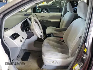 2011 Toyota Sienna LE AAS with VIN 5TDKK3DC8BS117009, listed as a Copart auction lot 56035065 with 148,160 mi miles and Salvage Title. Bid and sale history available at DreamBid. Image 7.
