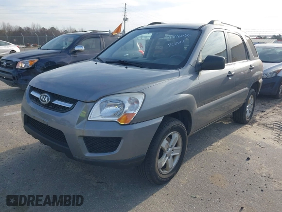 2010 Kia Sportage LX with VIN KNDKGCA36A7710107, listed as a IAAI auction lot 41846066 with 144,662 mi miles and . Bid and sale history available at carsss.com. Image 2.