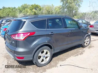 2016 Ford Escape SE with VIN 1FMCU9GX5GUC24730, listed as a IAAI auction lot 40172504 with 139,925 mi miles. Bid and sale history available at carsss.com. Image 4.