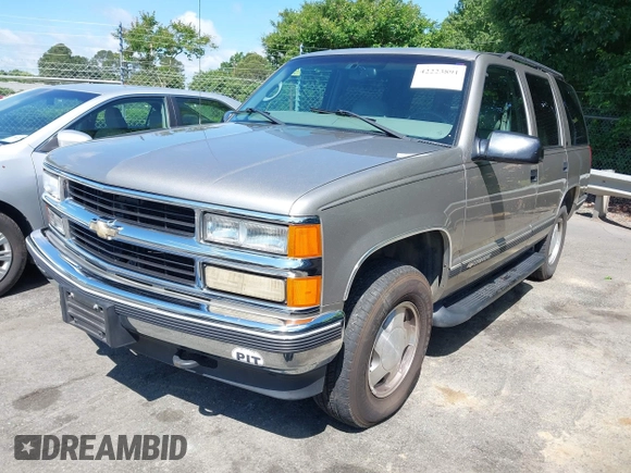 1998 Chevrolet Tahoe z VIN 1GNEK13R0WJ321045, wystawiony jako IAAI lot #42223891 z przebiegiem 192 041 mil mil oraz . Historia ofert i sprzedaży dostępna na DreamBid. Obrazek 6.