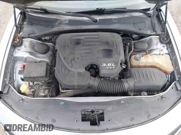 2015 Dodge Charger SXT with VIN 2C3CDXHG4FH884058, listed as a IAAI auction lot 41724894 with 202,701 mi miles and . Bid and sale history available at DreamBid. Image 10.