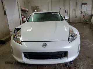 2013 Nissan 370Z Touring z VIN JN1AZ4EH5DM383466, wystawiony jako Copart lot #85704054 z przebiegiem 37 892 mil mil oraz Szkoda całkowita • Salvage title. Historia ofert i sprzedaży dostępna na DreamBid. Obrazek 5.