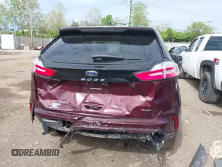 2021 Ford Edge Titanium with VIN 2FMPK4K99MBA41965, listed as a IAAI auction lot 42114607 with 87,848 mi miles and . Bid and sale history available at DreamBid. Image 17.