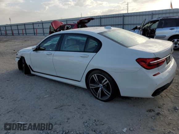 2018 BMW 7 Series 740i with VIN WBA7E2C55JG742869, listed as a Copart auction lot 52317095 with 0 mi miles and Salvage Title. Bid and sale history available at carsss.com. Image 2.